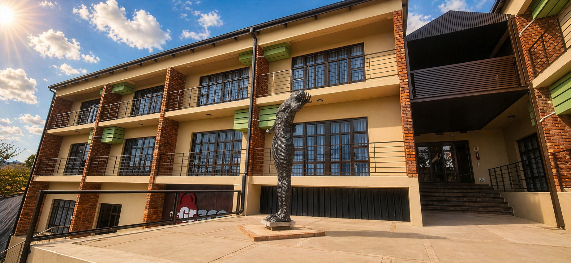 The Grace Hotel courtyard with statue